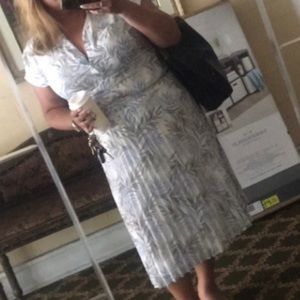 Pleated skirt and short sleeve button up set